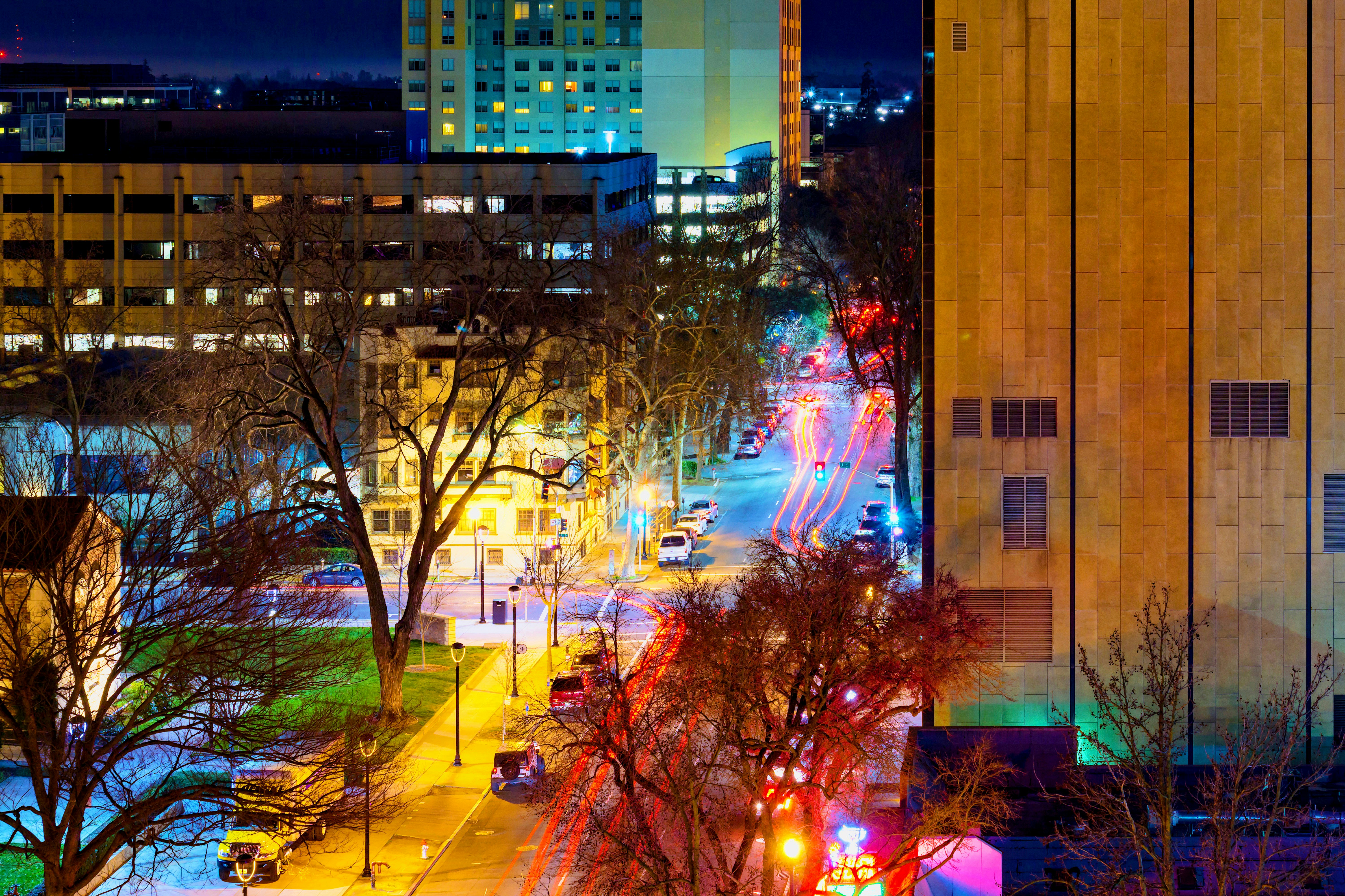 time lapse photography of cars on city